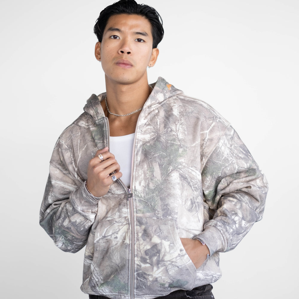 
                      
                        Luxury Zip Hood - Bush Camo
                      
                    